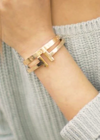 Doble T brazalete